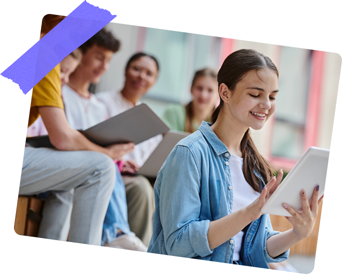 High school students reviewing their Digital Footprint Score on tablets, improving online presence with Student Profile Pro services.